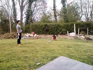 Girl falls adorably after getting hit by ball