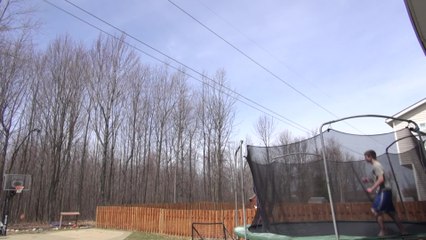 Incredible Backflip Trick Shot on a Trampoline