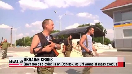 Ukrainian forces close in on Donetsk, as UN warns of mass exodus