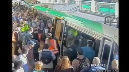 Passengers free man from train platform