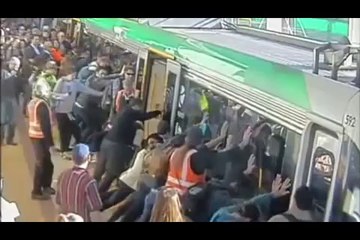 People power frees man trapped by Perth train!!