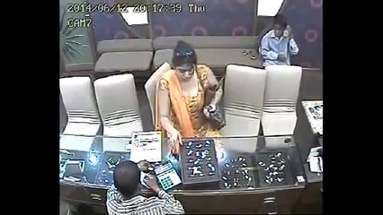 CCTV-Lady steals Jewellery In A Shop