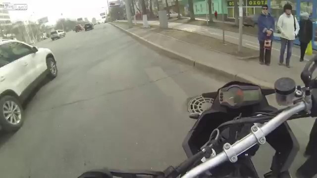 Biker Helps Grandfather Cross the Road