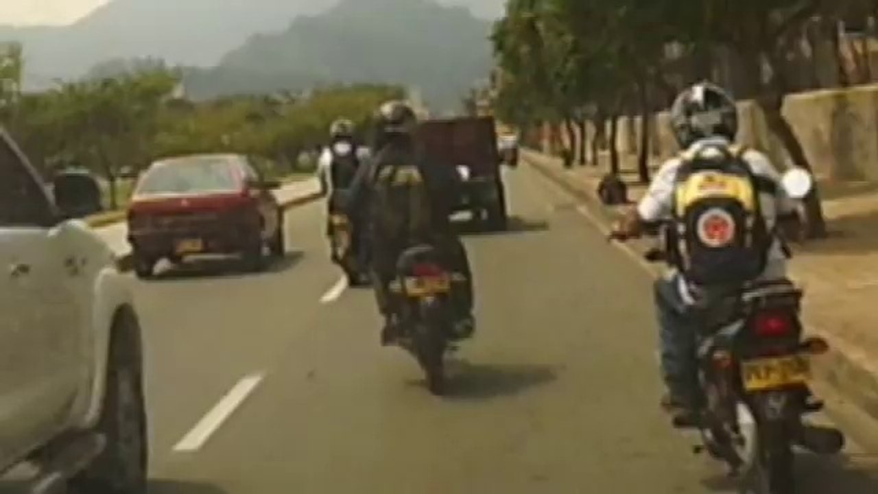 Motorcycle Crashes Into A Car