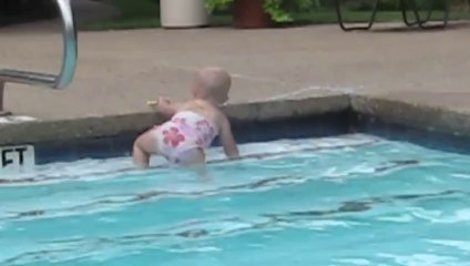 Toddler swims solo