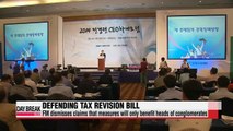 Finance minister defends government's tax revision