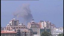 Un nuage de fumée s'élève au dessus de Gaza après une frappe israélienne