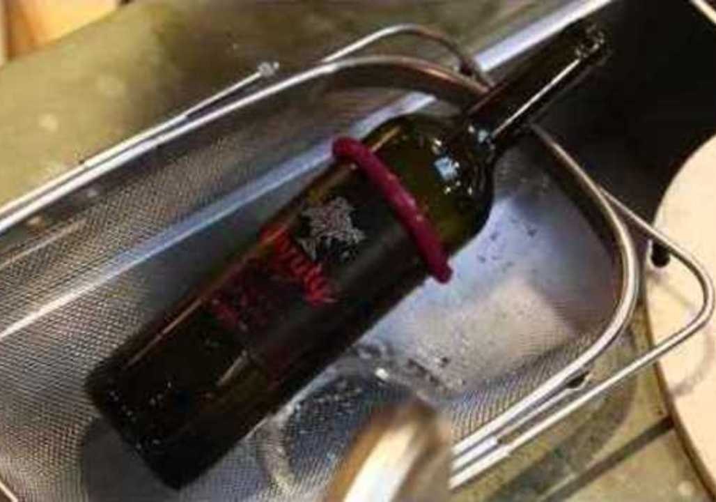Boy Shows How to Turn Wine Bottle Into Drinking Glass