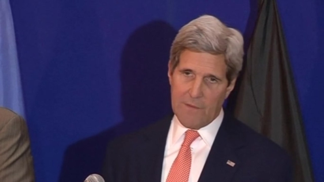 Kerry says militant campaign in Iraq bears "warning signs of genocide"