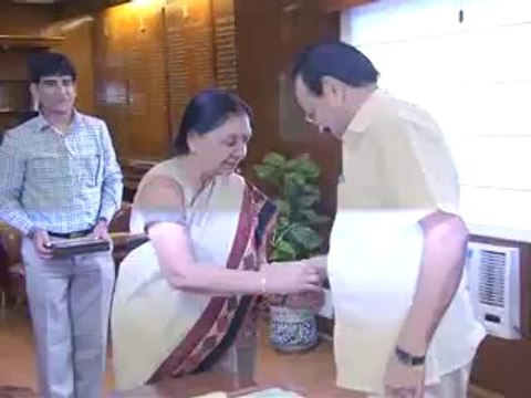Anandiben Patel Gujarat CM ties Rakhi Minister Sadananad Gowda
