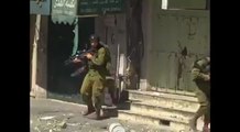 Resistance by palestinians at Hebron to Israeli force