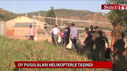 Oy pusulaları helikopterle taşındı