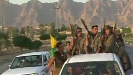 Warm welcome in Kirkuk for convoy of Kurdish fighters