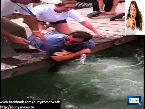 Fish Grabs Mans Arm Goes dangerous