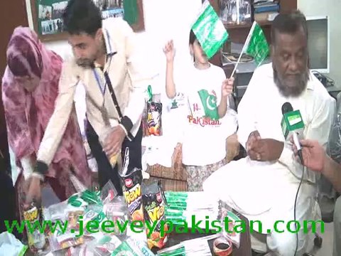 Dr. Asif Mehmood Jah talking with Shakeel Anjum of Jeevey Pakistan about Celebrations of Pakistan Day with IDPs in Relief Camp.