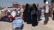 Thousands of Yazidi refugees reach sanctuary in Iraqi Kurdistan