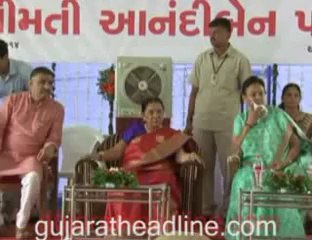 Anandiben Gujarat Chief Minister ties Rakhi to Policeman of Gujarat
