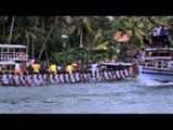 Oarsmen in action during the Champakulam boat race - Kerala