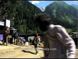 Pilgrims and sadhus at Chandanwari base camp during Amarnath yatra