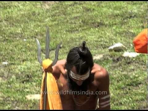 Pilgrims relax on trail to Amarnath cave shrine