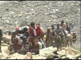 Hindu pilgrims riding ponies en route holy Amarnath cave