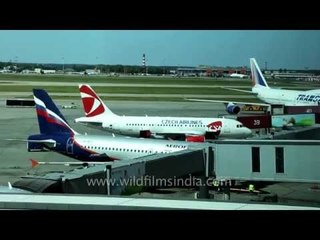 Flight engineer places paper on cold metal before sitting on it - Moscow Airport