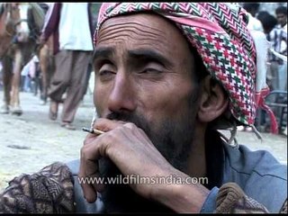 Pilgrim smokes tobacco