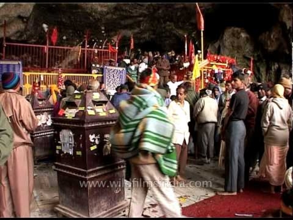 Hindu devotees perform rituals at Amarnath Temple in Kashmir