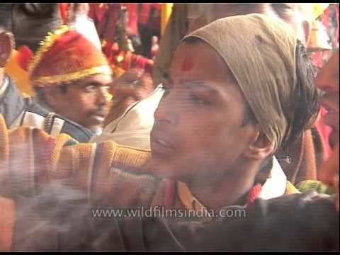 Devotees take blessings from fire flames at Amarnath Temple