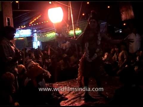 Hindu devotee dressed as Lord Shiva dances - Amarnath Yatra