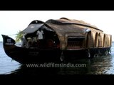 Houseboat glide along backwaters of Kerala