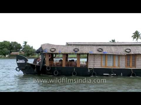 Houseboat floats on backwaters of Kerala