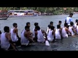 Group of people participates in Champakulam snake boat race, Kerala