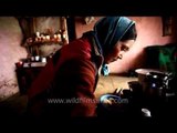 Ladakhi woman makes butter tea