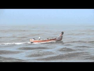 Boat ride on rolling sea waves - Neendakara, Kerala