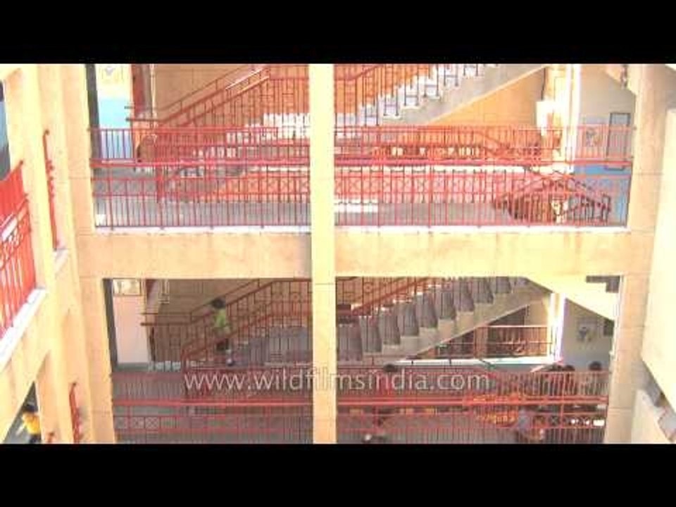 Students walk around school corridor: The Shri Ram School, Delhi