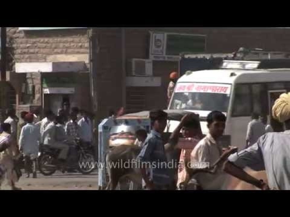 Crowded market filled with people, traffic  in Rajasthan