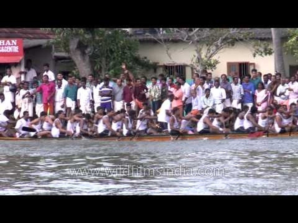 Spectators cheer participants : Snake boat race, Champakulam