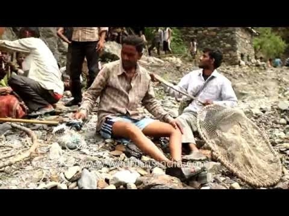 Man bandages sandals to ankles prevent them flowing away in river: maung Mela