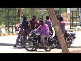 Men playing Holi with friends in Jodhpur - Rajasthan