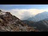 Clouds moving in fast motion over Himalayan mountain range