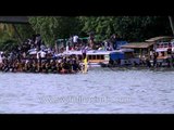 Men rowing during a traditional boat race in India - Champakulam Boat race