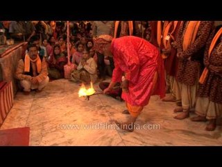 Woman goes into trance during aarti at Nanda Devi temple
