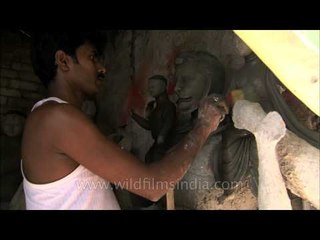 Artist crafts an idol at Kumartuli, Kolkata