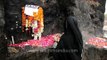 Devotees offer prayer to Djinns - Feroz Shah Kotla Fort