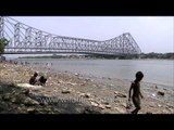 Children playing on the shores of Hooghly river - Kolkata