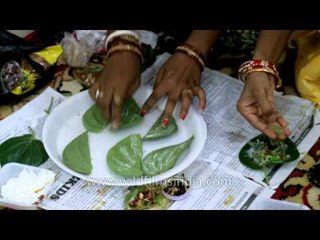 Women prepare pan during a competition