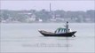 A man rowing boat on Hooghly River - Kolkata