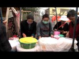 Women sell 'Liangfen' during Kalachakra in Bodhgaya