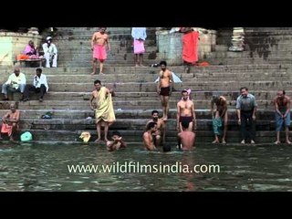 People takes holy dip in river Ganga - Uttar Pradesh